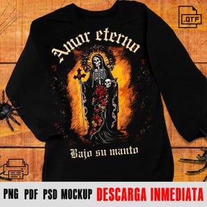 May include: Black long-sleeve shirt featuring a graphic of a skeleton figure with a cross and skull, surrounded by roses and the text "Amor eterno" and "Bajo su manto". The shirt also has the text "PNG PDF PSD MOCKUP DESCARGA INMEDIATA".