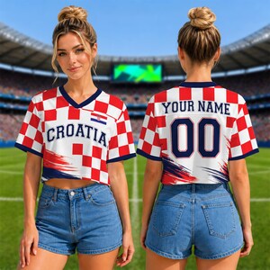 May include: A short-sleeved V-neck crop top featuring a red and white checkered pattern. The front displays the text CROATIA and a small Croatian flag. The back features the text YOUR NAME and the number 00 in dark blue with a brushstroke design.