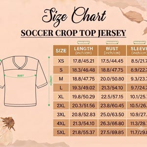May include: A size chart for a soccer crop top jersey featuring a line drawing of the garment with labeled length, bust, and sleeve measurements. A table provides specific dimensions in inches and centimeters for sizes XS through 5XL.