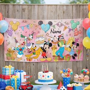 May include: A pink birthday banner featuring Disney characters Mickey Mouse, Minnie Mouse, Donald Duck, Daisy Duck, Goofy, and Pluto. The banner has a heart-shaped balloon with the number 5 and space for a name. Balloons, gifts, and a cake are also visible.