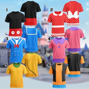 May include: A selection of six brightly coloured t-shirts with cartoon character designs. The shirts feature various patterns, including polka dots and bows. The shirts are displayed against a blurred background, with a castle visible.