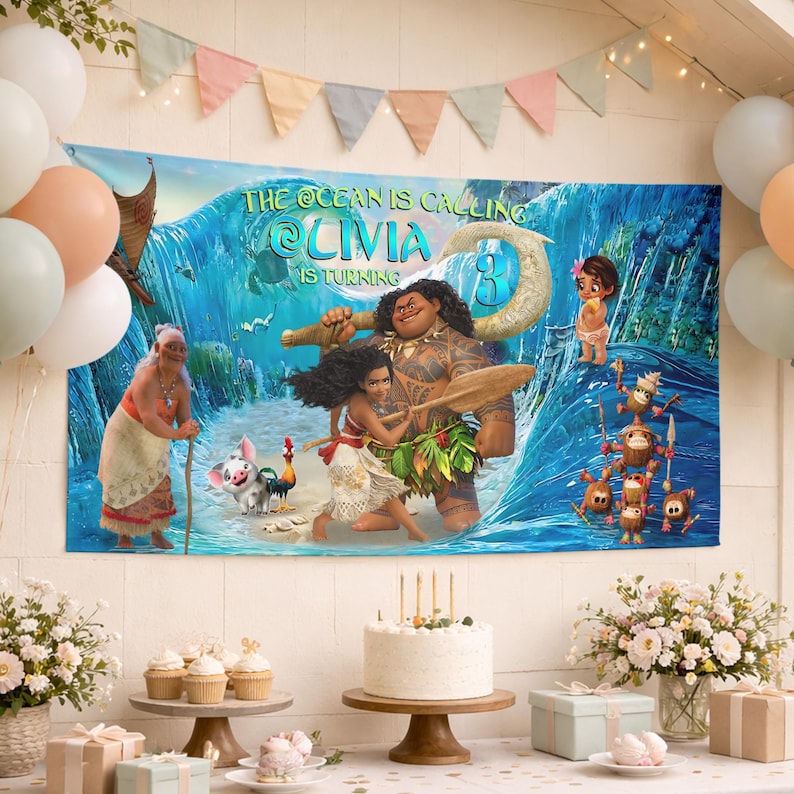 May include: A rectangular party banner featuring a Moana-themed graphic with the text THE OCEAN IS CALLING OLIVIA IS TURNING 3. The design displays characters including Moana, Maui, Pua, Heihei, and Kakamora against a blue ocean wave background.