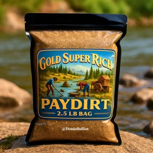 May include: A black bag filled with paydirt, labeled "Gold Super Rich Paydirt." The label features a landscape scene of gold panning. The bag is marked as a 2.5 LB bag, with the seller's handle @DeminBullion.