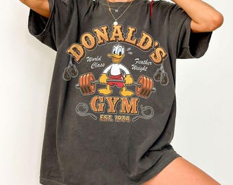 Funny Disney Donald Duck World Class Gym Est 1934 Comfort Colors Shirt, Walt Disney World Tee, Disneyland Family Trip 2026, Workout Fitness