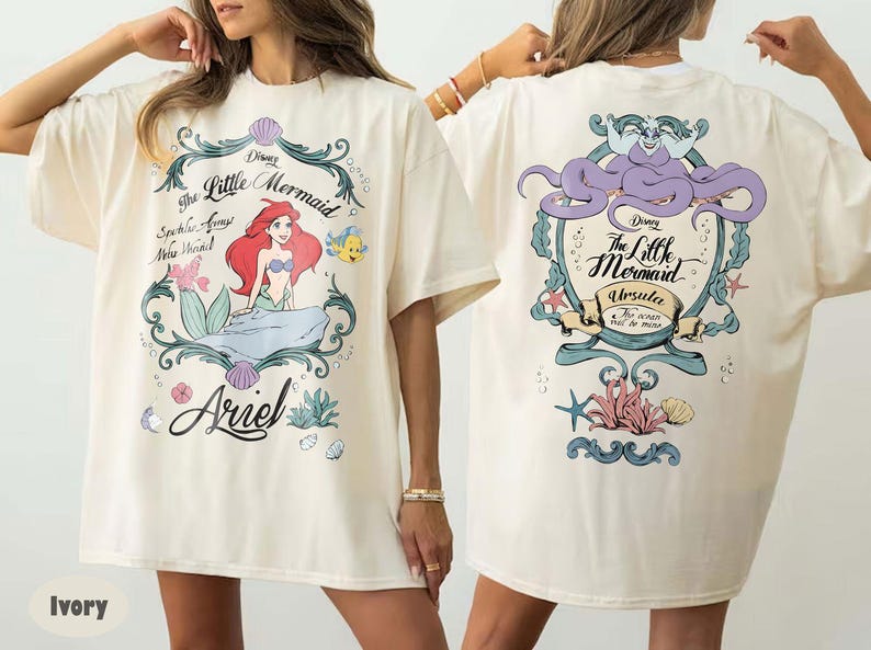 May include: A white ceramic mug with a black handle and the text "But First, Coffee" in a black, handwritten-style font. The mug is on a white surface.