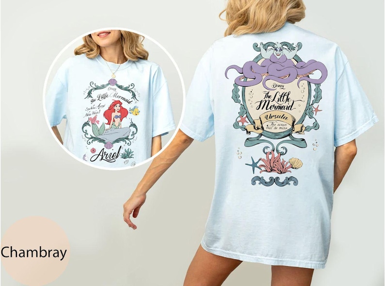 May include: Light blue t-shirt featuring a graphic from Disney's The Little Mermaid. The front design includes Ariel, while the back showcases Ursula. The shirt has short sleeves and a relaxed fit, perfect for casual wear.