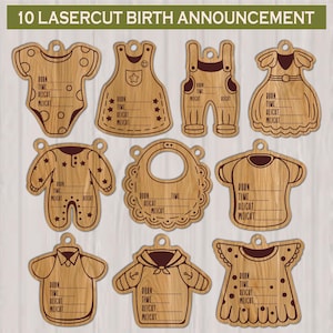 May include: Ten wooden laser-cut birth announcement ornaments in the shape of baby clothes, such as a onesie, dress, and bib. Each ornament has space to write the baby's birth details. The text "10 LASERCUT BIRTH ANNOUNCEMENT" is at the top.