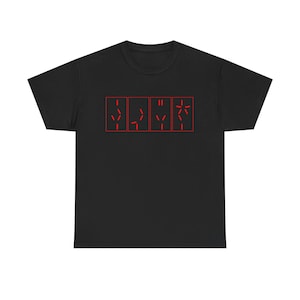 May include: Black t-shirt with red graphic text. The text is composed of four rectangular boxes, each containing a series of red lines and symbols. The design is centered on the front of the shirt.