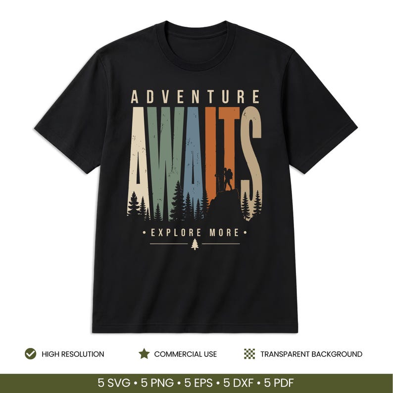 May include: A black short-sleeve t-shirt featuring a graphic design with the text ADVENTURE AWAITS in large, multi-colored, distressed-style letters. Below the text is a silhouette of a hiker on a mountain peak with pine trees and EXPLORE MORE.