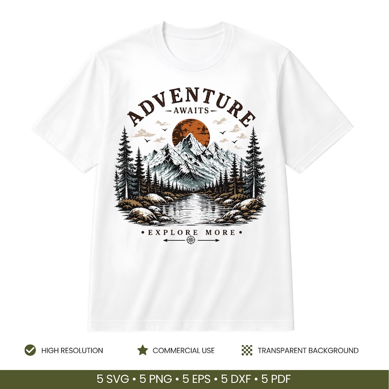 May include: A white t-shirt featuring a graphic illustration of a mountain range, a forest, and a lake under a dark orange sun. The text ADVENTURE AWAITS is arched above the mountains, and EXPLORE MORE is printed below the lake with a compass icon.
