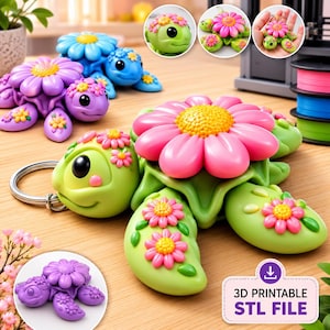 May include: A light green turtle keychain featuring a large pink flower on its shell and smaller pink flowers on its flippers. The turtle has a smooth finish, black eyes, and a metal ring. A label reads 3D PRINTABLE STL FILE with a download icon.