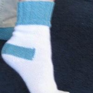 May include: White ankle socks with a teal blue stripe on the heel and a teal blue cuff.