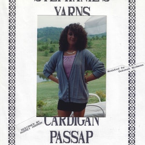 May include: A knitting pattern for a cardigan from Stephanie's Yarns. The image shows a woman in a blue cardigan, pink top, and black shorts. The pattern is labelled "CARDIGAN PASSAP" and "STEPHANIE'S YARNS".