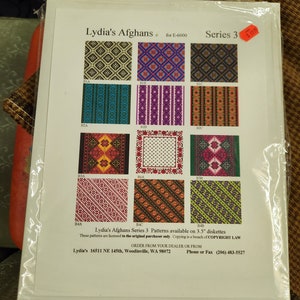 May include: A brochure for Lydia's Afghans Series 3, featuring nine different colorful afghan patterns. The brochure states that the patterns are available on 3.5 inch diskettes and are licensed to the original purchaser only. The brochure also includes contact information for Lydia's Afghans.