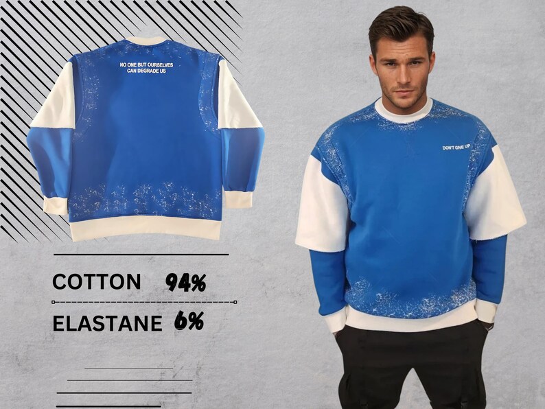May include: Blue and white sweatshirt with a white collar and white sleeves. The sweatshirt has a white print on the front that says "NO ONE BUT OURSELVES CAN DEGRADE US". The sweatshirt also has a white print on the back that says "DON'T GIVE UP".