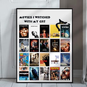 May include: A black and white poster with the text "Movies I Watched With My Cat" and a black cat silhouette. The poster features a grid of movie posters, including "Magnolia", "Dogville", "Spirited Away", "My Neighbor Totoro", "Mononoke", "Chicago", "Little Women", "Portrait of a Lady on Fire", "Toy Story", "Lord of the Rings", "Reservoir Dogs", "Forrest Gump", "Requiem for a Dream", "Life is Beautiful", "Pulp Fiction", and "Leon".
