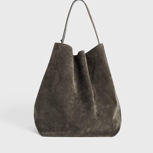 minimalist leather tote bag
suede tote for everyday use
luxury suede leather purse
adjustable strap suede tote
casual brown suede handbag
travel tote bag suede leather
work tote bag suede leather
eco friendly leather tote bag
autumn suede leather handbag
handmade brown suede leather tote
large suede handbag for women
oversized leather shoulder bag brown
luxury cowhide suede tote bag
premium quality suede leather purse
handcrafted leather tote for work
genuine suede leather shoulder bag for her
