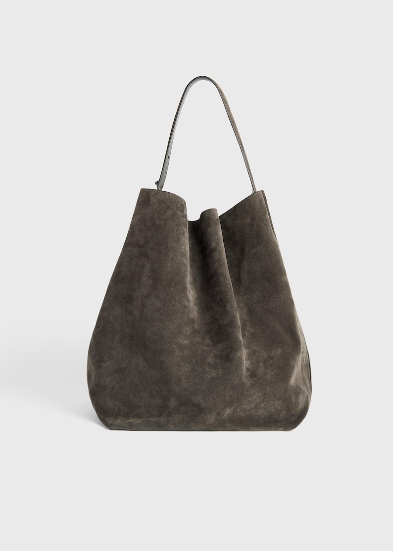 minimalist leather tote bag
suede tote for everyday use
luxury suede leather purse
adjustable strap suede tote
casual brown suede handbag
travel tote bag suede leather
work tote bag suede leather
eco friendly leather tote bag
autumn suede leather handbag
handmade brown suede leather tote
large suede handbag for women
oversized leather shoulder bag brown
luxury cowhide suede tote bag
premium quality suede leather purse
handcrafted leather tote for work
genuine suede leather shoulder bag for her