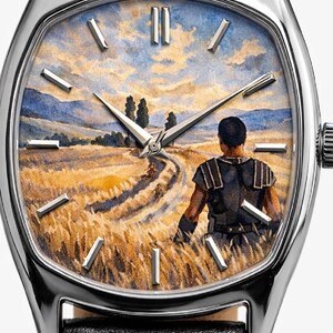 May include: A wristwatch with a silver-toned case and a black leather strap. The watch face features a detailed painting of a person standing in a golden wheat field under a blue sky, with silver-toned hour markers and three central hands.