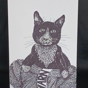 Katze mit Garn