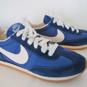 nike shoes with blue swoosh