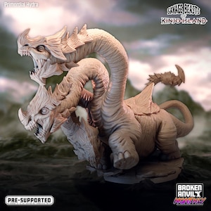 May include: A three-headed hydra miniature, painted in a light brown color, with a textured surface. The miniature is posed in a dynamic stance, with its heads raised and its tail curled. The miniature is part of the Savage Beasts of Kinjo Island collection.