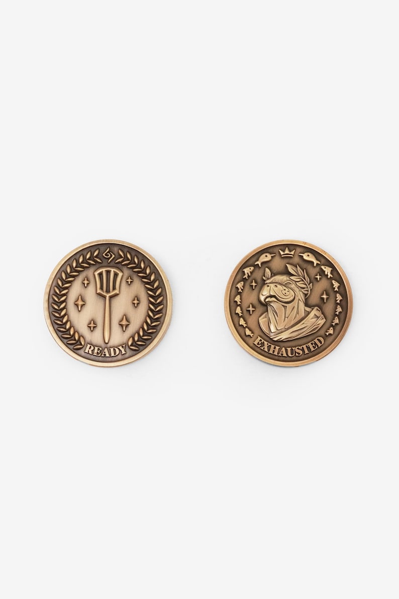 Ready and Exhausted faces of the Riftbound gold coin token — Urf trident and laurel-crowned manatee