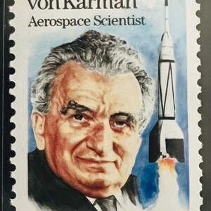 May include: A postage stamp featuring Theodore von Kármán, an aerospace scientist. The stamp includes a portrait of von Kármán, a rocket launching, and the text "USA 29". The stamp has a white border with a scalloped edge.