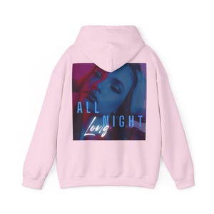 May include: Pink hoodie with a graphic print of a woman's face and the text "ALL NIGHT Long" in blue neon lettering.