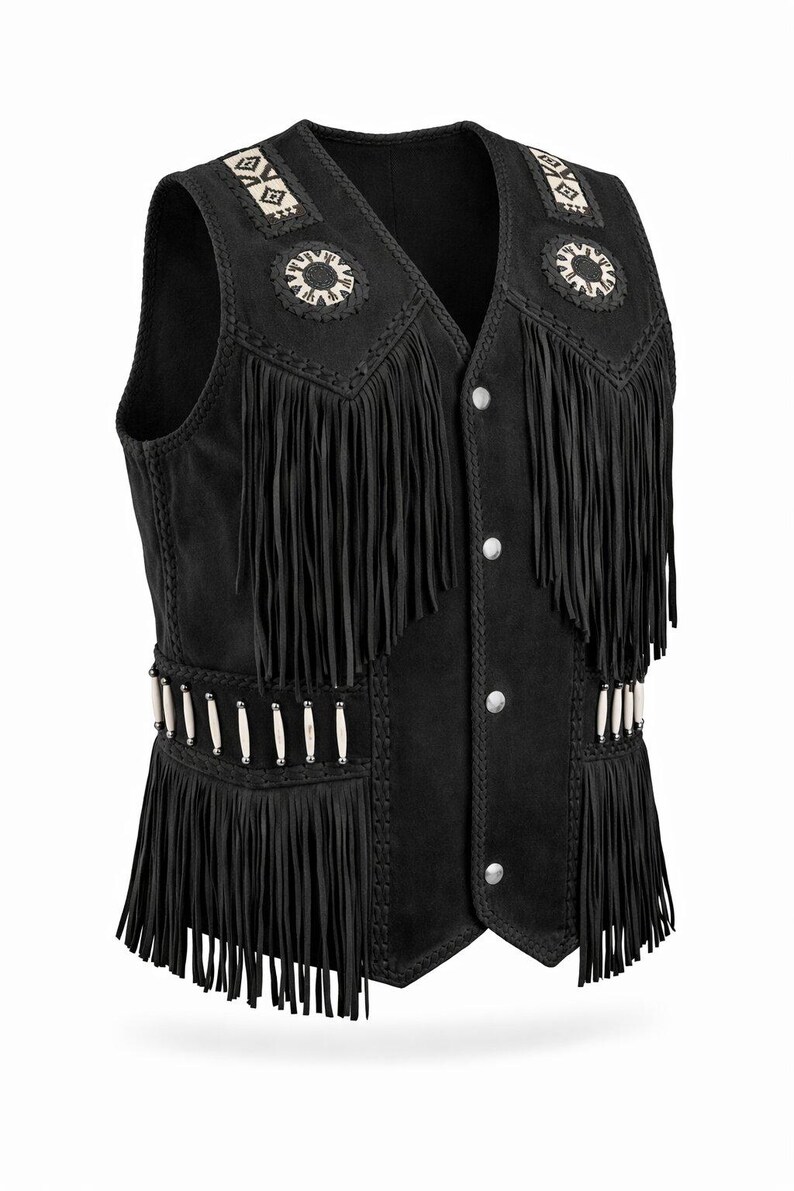 May include: Black suede vest with fringe detailing, decorative beading, and silver-tone buttons. The vest features a V-neck and decorative patterns on the shoulders. A classic western-inspired garment.
