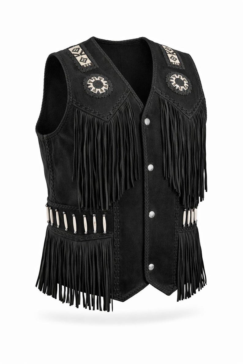 May include: Black suede vest with fringe detailing and decorative beadwork. The vest features a V-neck, silver-tone buttons, and fringe along the hem and shoulders. The vest has a Western or Native American-inspired design.