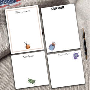 May include: Four blank stationery note cards with the name "Kevin Moore" printed on each card. Each card features a different insect illustration: a ladybug, a blue beetle, a green beetle, and a purple beetle.