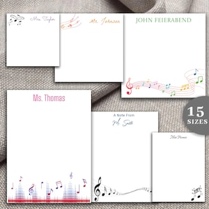 May include: White notepads with musical notes and names like "Mrs. Taylor," "Mr. Johnson," and "John Feierabend." Some pads feature colorful musical staff designs. The image also displays "15 SIZES."