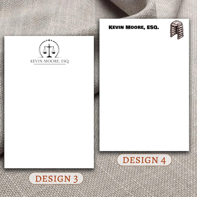 May include: Two designs for letterhead stationery. The first design features a scale of justice with the text "Kevin Moore, Esq." The second design features a gavel with the text "Kevin Moore, Esq."