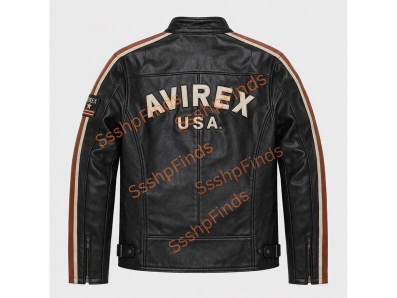May include: Black leather jacket with brown and cream stripes on the sleeves and shoulders. The back of the jacket features the word "AVIREX" above "USA" in cream-colored lettering. A small patch with text is on the left sleeve.