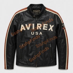 May include: Black leather jacket with a stand-up collar, zipper closure, and the text "AVIREX USA" across the chest. Features brown and white stripes down the sleeves and a small patch on the upper arm.
