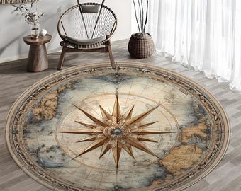 May include: A round area rug with a vintage map design. The rug features a compass rose in the center, surrounded by a detailed world map in shades of beige, blue, and brown. The rug is placed on a wooden floor.