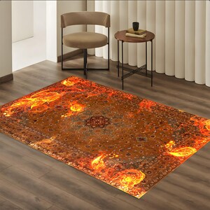 May include: A brown and orange area rug with a detailed floral pattern. The rug has a fiery orange glow emanating from the center.