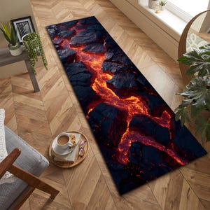 May include: A rectangular rug with a striking design resembling a lava flow. The rug features a dark, textured background with vibrant orange and red streaks, creating a dramatic and eye-catching visual. The rug's dimensions are not visible.