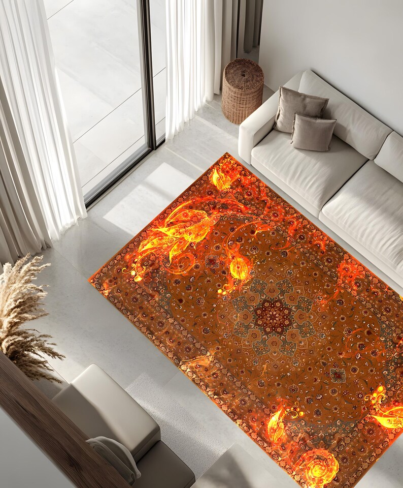 May include: A large, rectangular rug with a detailed, intricate design in shades of orange, yellow, and brown. The rug features a central medallion with floral motifs and a swirling pattern.