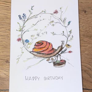 Original handgemalte und handbeschriebene Aquarell- Geburtstagskarte mit Glitzereffekt, Blumenkreis mit Schnecke