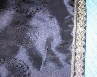 Navy blue silky table runner with sequins and trimmed ends