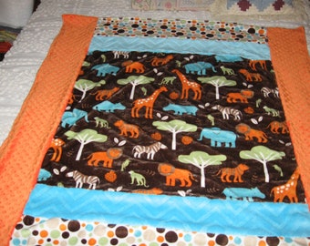 Soft Minky blanket with Jungle animals in turquoise, orange and brown