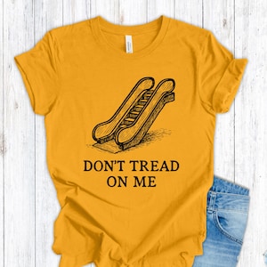 Don't Tread On Me Escalator Shirt, Historic Flag Trump Escalator Satire T-Shirt, Funny Anti-Trump Gadsden Flag Tee, Yellow Liberal Tshirt