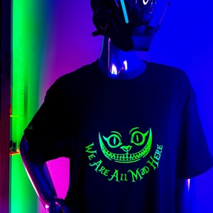 We Are All Mad Here T Shirt/Glows in BLACKLIGHT!!!/Purrrfect for your next Rave/EDC/Nocturnal Wonderland event