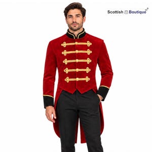 May include: A red velvet tailcoat jacket featuring a black mandarin collar with gold trim, five rows of gold braided cord closures with gold buttons, and black cuffs with gold piping. The text Scottish Boutique is visible in the top right corner.