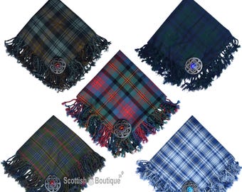 May include: Five tartan scarves in various colors, including green, blue, and red, are displayed. Each scarf has a decorative brooch and fringe trim. The text "Available in 50+ Tartans" is at the top.
