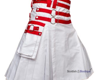 May include: White kilt with red straps and buckles. The kilt has a large cargo pocket on the side. The text "Scottish Boutique" is visible on the bottom right corner of the kilt.