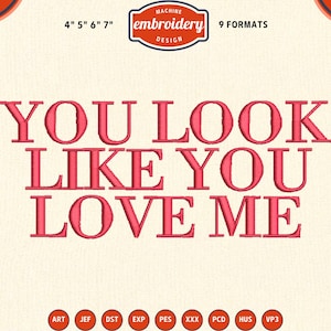 Pode incluir: Design de bordado à máquina com o texto "YOU LOOK LIKE YOU LOVE ME" em vermelho. O design inclui o texto "MACHINE embroidery DESIGN" em uma faixa vermelha e branca. Disponível em 9 formatos. Tamanhos: 10, 12, 15, 18 cm.