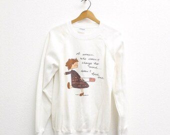 Vintage Sweatshirt aus den 80er-Jahren mit dem Aufdruck „Eine Frau, die ihre Meinung nicht ändert, hat keine“, Größe L